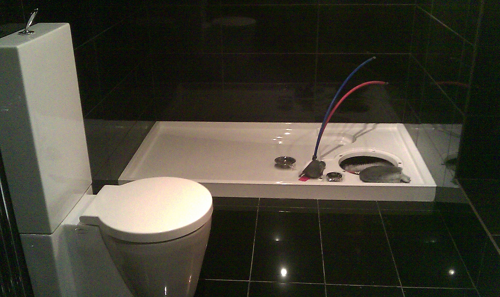 Shower tray with hot & cold feeds.